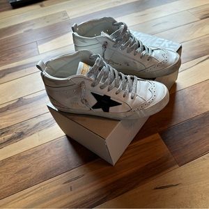 Golden Goose Mid-Star sneakers with laminated heel tab and glittery laces